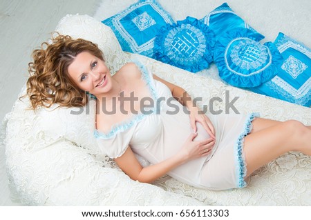 Pregnant Woman Resting on the Sofa at Home