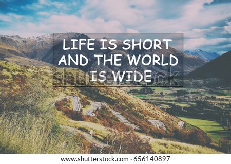 Life is short and the world is wide - Inspirational quote on blurred background with vintage filter