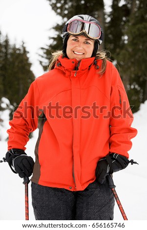 Female skier looking at camera