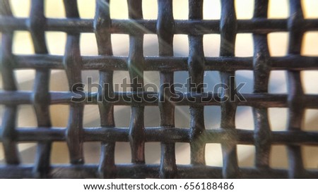 detail black square net fence background
