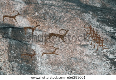 Picture of a caveman. Scene of hunting ancient people on animals. Primitive, stone age. archeology.