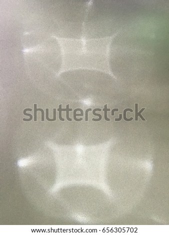Reflect of light on the glass and white gray background