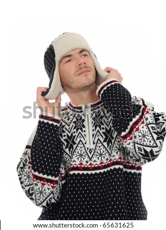 Funny winter man in warm hat and clothes listening. isolated on white background
