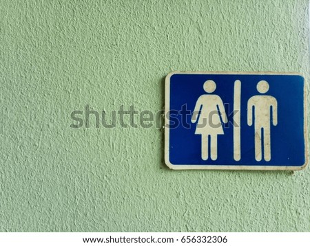Male and female toilet sign