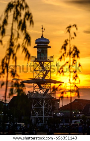 The grand mosque tower Demak when the sun goes down