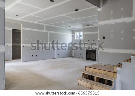 Partially completed interior remodel of home. Royalty-Free Stock Photo #656375515