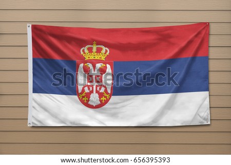 Serbia Flag hanging on a wall