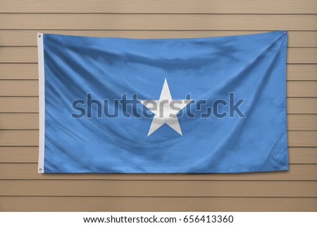 Somalia flag hanging on a wall