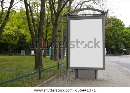 Blank billboard mock up in a bus stop