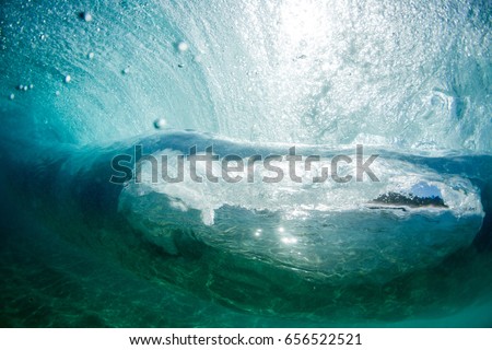 emerald Wave breaking in tropical island waters