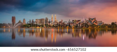 Kuala Lumpur Panorama. Panoramic image of Kuala Lumpur, Malaysia skyline during sunset. Royalty-Free Stock Photo #656527102