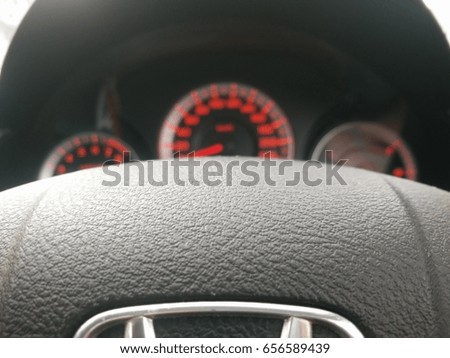 Behind the wheel