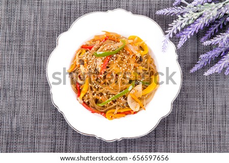 "Stir-fried Glass Noodles and Vegetables" (Japchae) - Korea Food Royalty-Free Stock Photo #656597656