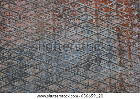 Pattern of old metal diamond plate, Surface of black steel floor non-skid seamless with dirty stain, Texture background