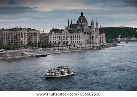 Budapest, Hungary, Danube boat in the background the Parliament