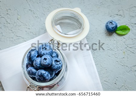 Fresh blueberries in a glass pot Summer time Healthy food