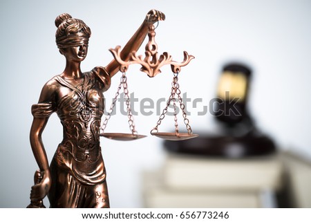 Judge Gavel, scale of Justice and books on white rustic table. Law theme 