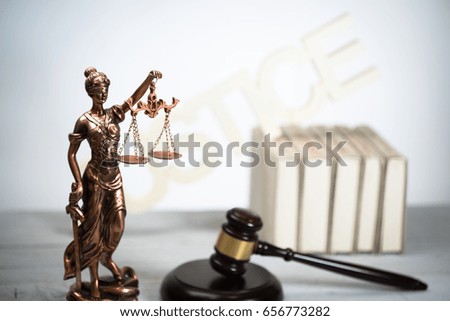 lady of Justice gavel and law books