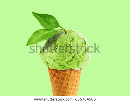 Ice cream cone of kiwi flavor, with copy space to add text, good to use as flayer or poster Royalty-Free Stock Photo #656784505