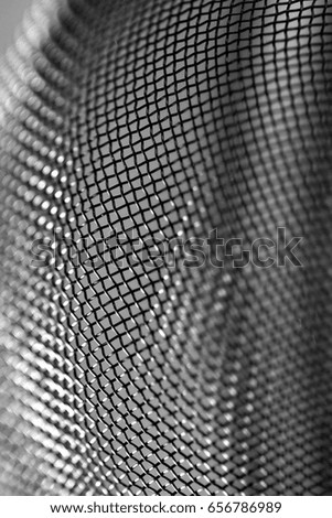 Curved metal mesh texture