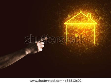 Hand of man touching with finger glowing home icon or symbol