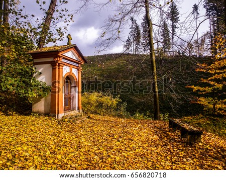 chapel in autumn leaves