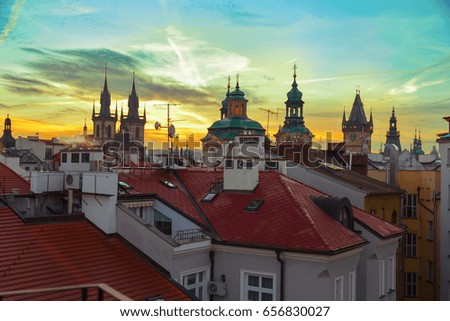 Sunset over the roofs of Prague's buildings, Czech Republic. Cityscape at sunset in the city of Prague