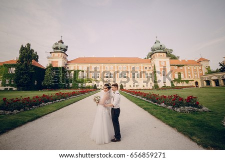 charming wedding in the old castle architecture Poland nature and the sun