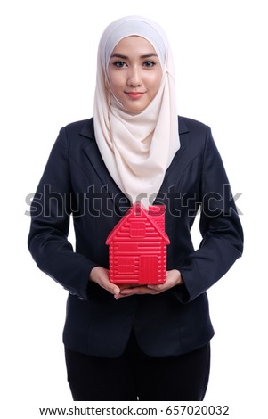 Portrait of Confidence Muslim Business woman hold home icon