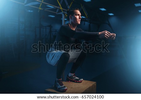 Athlete on training, endurance exercise with box