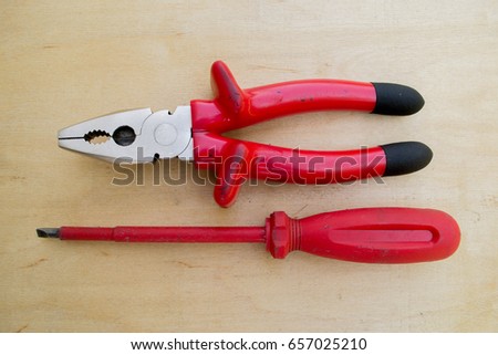 pliers, screwdriver