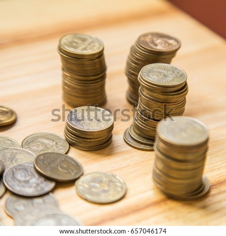 Old soviet coins on a wooden background. Historic, used currency.