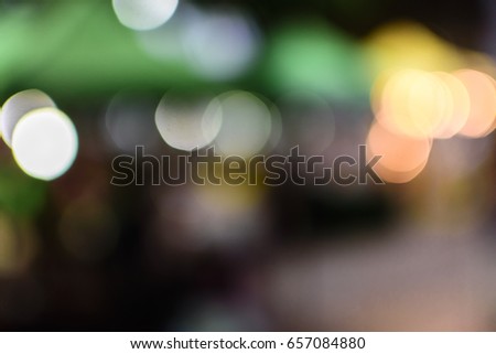 Blurred of restaurant at night.Shopping mall with bokeh blurred background.