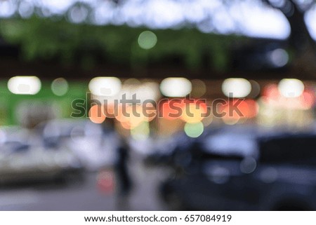 Blurred of restaurant at night.Shopping mall with bokeh blurred background.