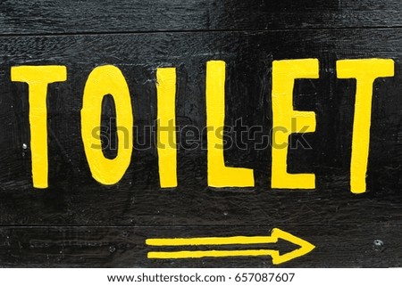 Symbolize arrow pointing go to way toilet