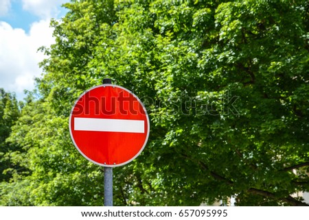 One way street sign wrong direction