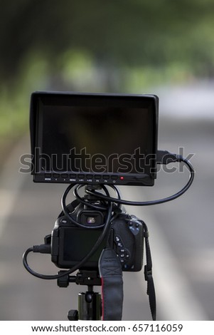 Video camera viewfinder - recording natural and street - focus on camera