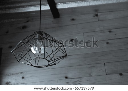 Industrial pendant lamps. The interior of the loft style. Gray b