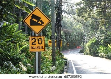 warning attention sign steep hill ascent the truck please low gear