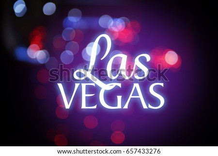 Inscription LAS VEGAS on blurred lights background. Travel USA concept