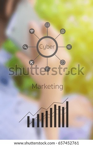 Selective focus hand. young relaxed woman talking with her mobile phone in a public garden.  graphs marketing and cyber technology background. Marketing checking on smartphone.