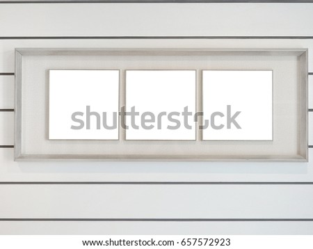 Modern frame on white wooden wall.