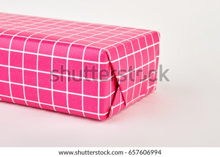 Cropped image of gift box. Bright present for holiday.