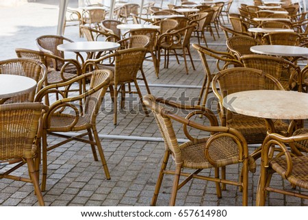 Wicker furniture in the summer café outside