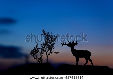 Moose Silhouette dark tone. plastic animal model.