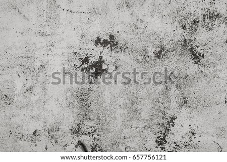 Gray grange wall texture for background with cracks and patterns