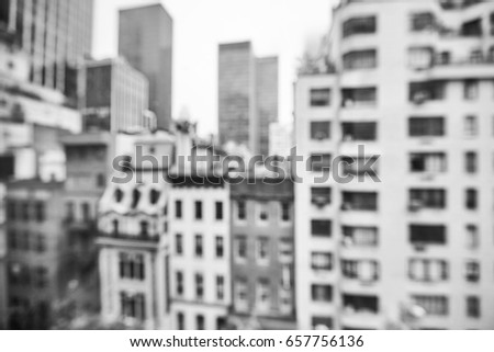 Blurred black and white photo of Manhattan Midtown buildings, New York City, USA. 