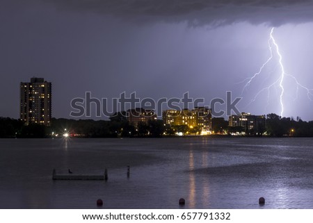 A Tight Shot of a Bolt of Lightning Striking across Bde Maka Ska, or Lake Calhoun, in South Minneapolis during a Thunderstorm