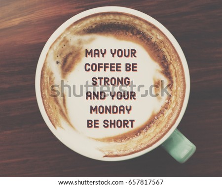 Inspirational quote on coffee cup on wooden table background with vintage filter