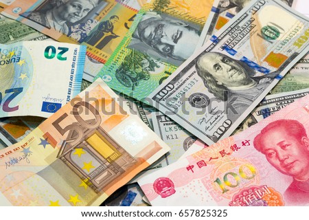 World's major currencies American dollar, Euro money, Australian dollar and Chinese yuan as money background. Royalty-Free Stock Photo #657825325